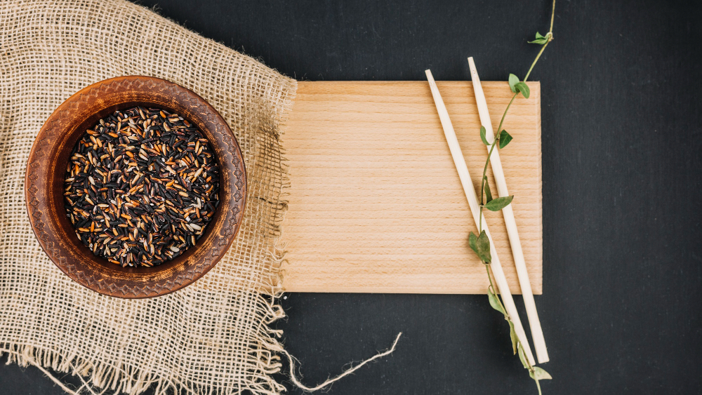 Traditional Chak-Hao Black Rice kheer served in an earthen bowl